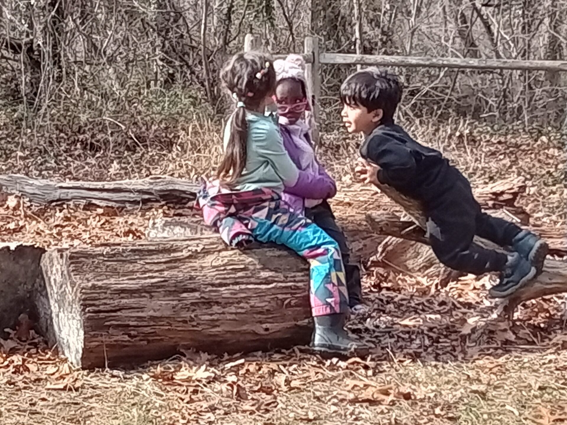 a little boy that is standing in the dirt